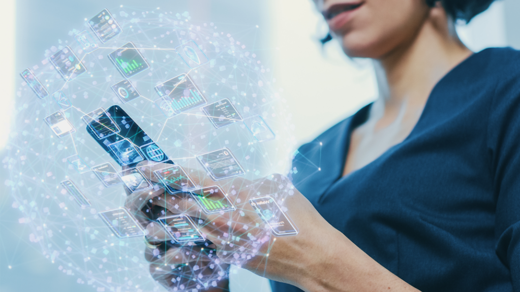 Person using a phone with floating application icons illustrating a connected and efficient health care system